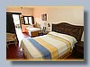 Hotel Hacienda Revolucion bedroom 3 pers.jpg