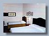 Hotel Hacienda Revolucion bedroom.jpg